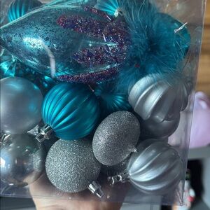 Christmas ornaments beautiful silver and blue .
2 boxes